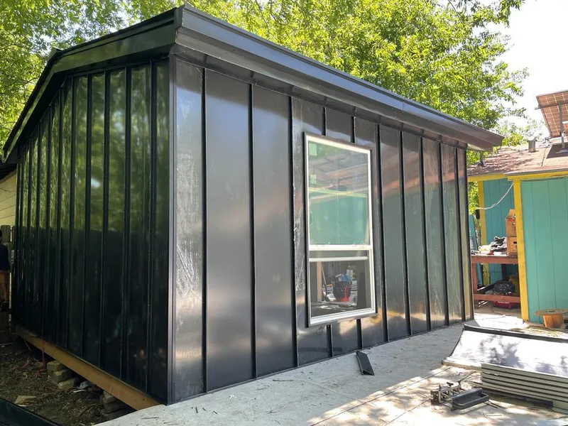 Black standing seam metal wall panels for Metal Roof Installation in Carencro